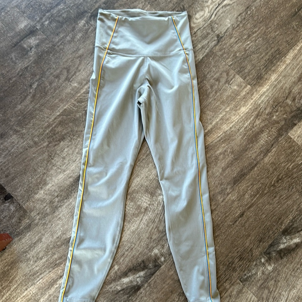 Nike women’s running tights   Size small women’s.  Gray with stripe